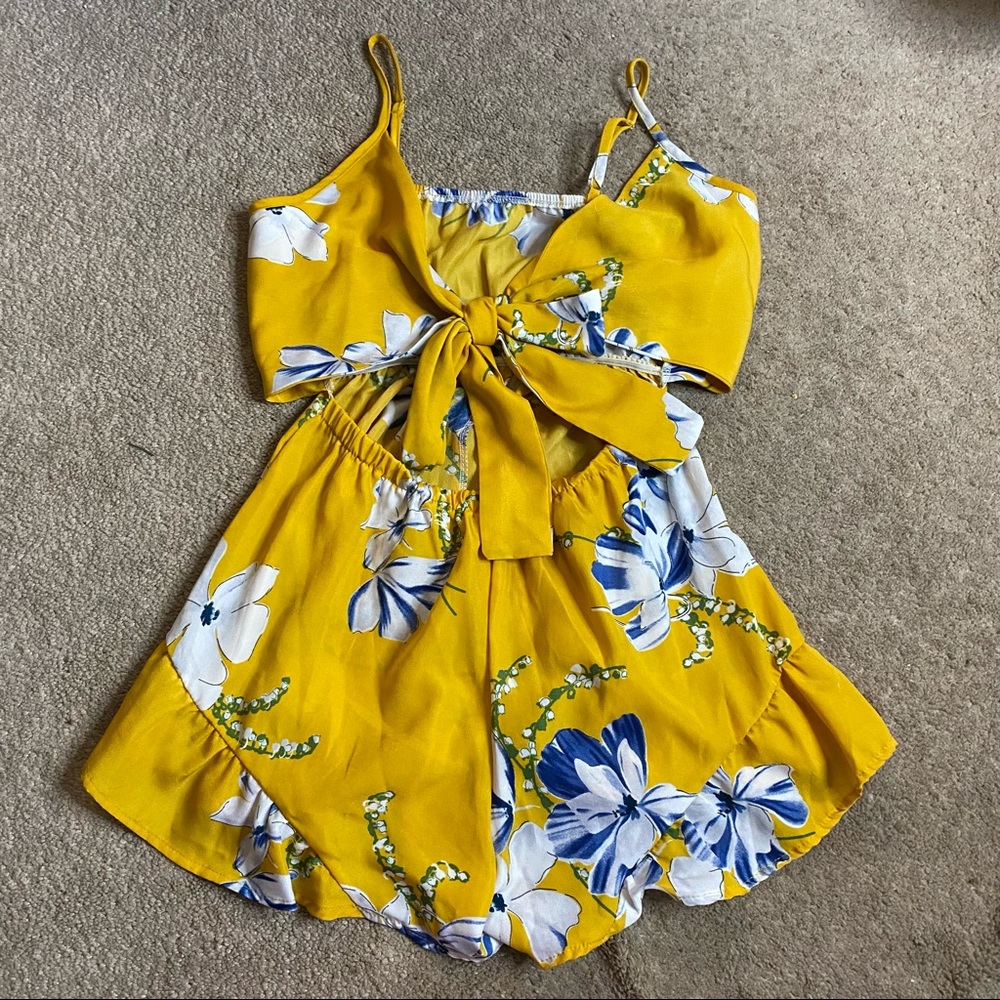 Ruffle romper with cut outs